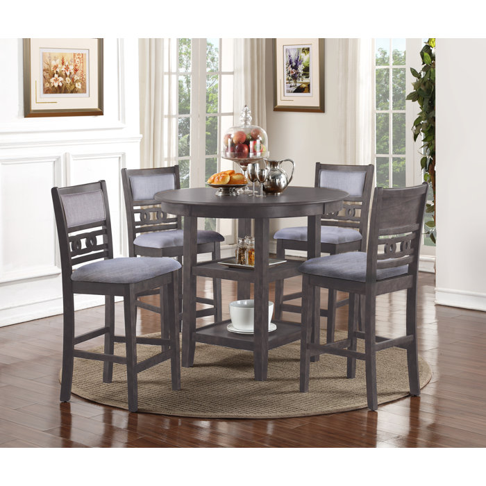 Winston Porter Jackins 4 Person Round Solid Wood Dining Set & Reviews